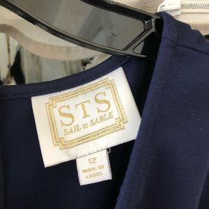 Dress blue poly top and brown faux leather skirt